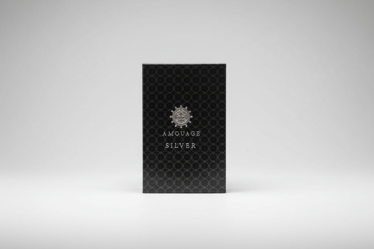 A.Mouge Silver product packaging with a patterned design on a white background
